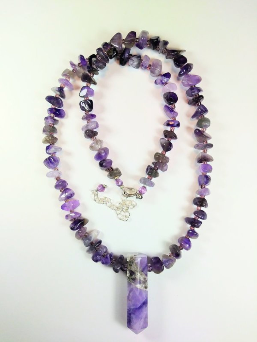  Amethyst necklace with silver clasp and chain. 